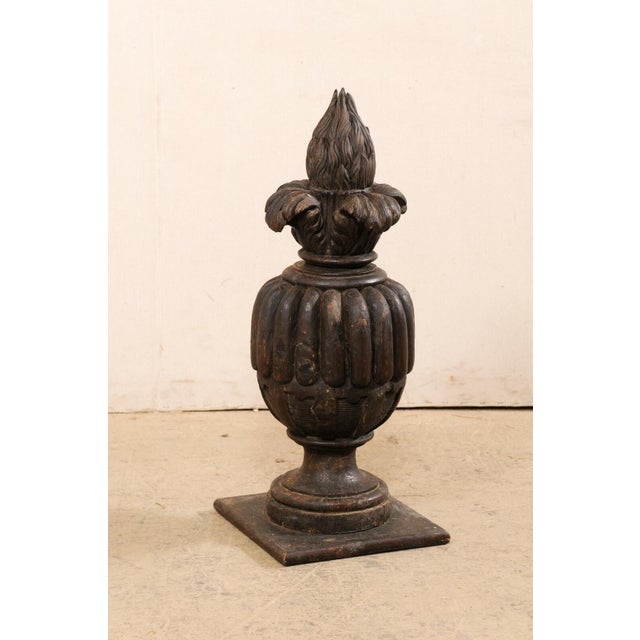An Italian carved-wood finial from the 19th century. This antique finial from Italy, standing approximately 2.75 feet in...