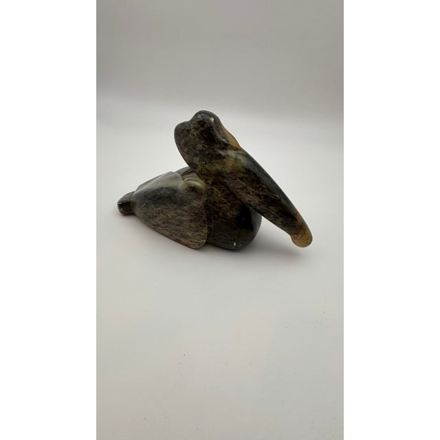 Beautiful vintage Miles Metzger hand-carved soapstone pelican sculpture, signed and dated 1986 and numbered 82/500. This...