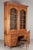 A grand scale 18th century French Louis XV Period bibliothèque, or bookcase, from the Loire Valley. Made of solid cherry...