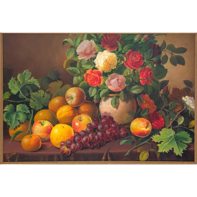 This original signed oil on canvas depicts a traditional still life featuring a bouquet of roses in a ceramic vase...
