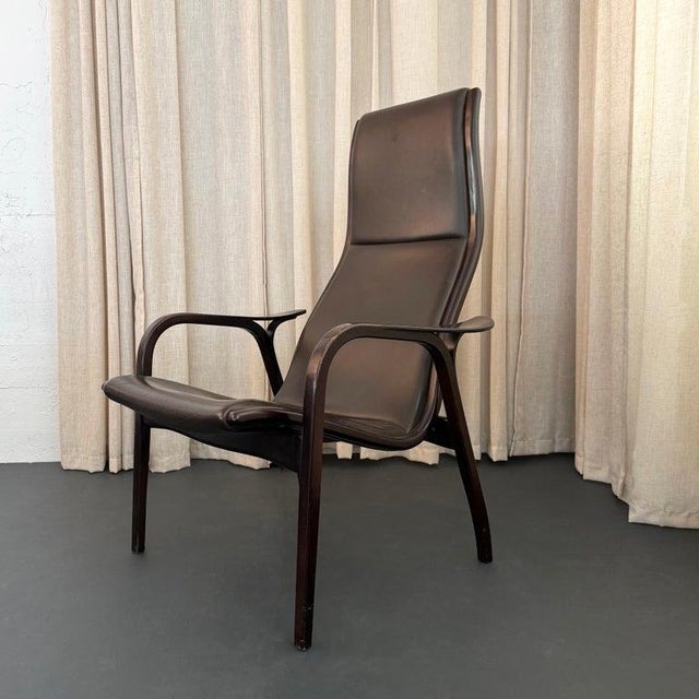 This iconic Lamino easy chair was designed by the acclaimed Swedish architect and designer Yngve Ekström in 1956,...