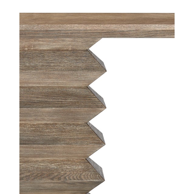 The wire-brushed and cerused finish on our Sayan Pepper Console Table, which we call light pepper, highlights the wood...
