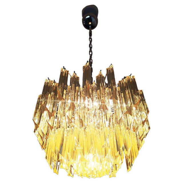 Fantastic vintage Murano chandelier made by 107 Murano crystal clear amber prism triedri in a nickel metal frame. Period:...