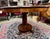 Rare parlor table crafted of walnut and mahogany. Carved feet. Circa 1880s. In amazing condition. 40"d x 27.5 h