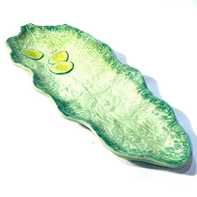 This charming "lettuce" ware relish tray is accented by three faux slices of cucumber. Created in the mid-twentieth...