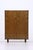 Vintage linen cupboard from the 1960s with clean lines and beautiful wood grain. The combination of shelves and three...