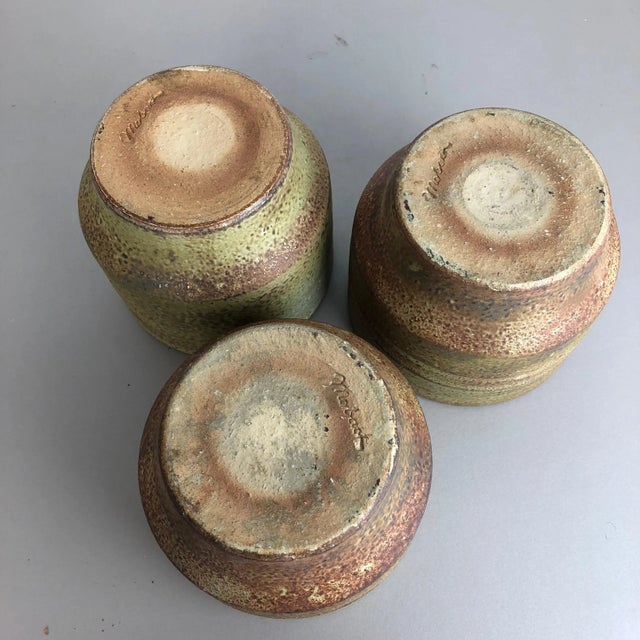 This set of 3 original vintage studio pottery vases was produced in the 1970s by Piet Knepper for Mobach in Utrecht,...