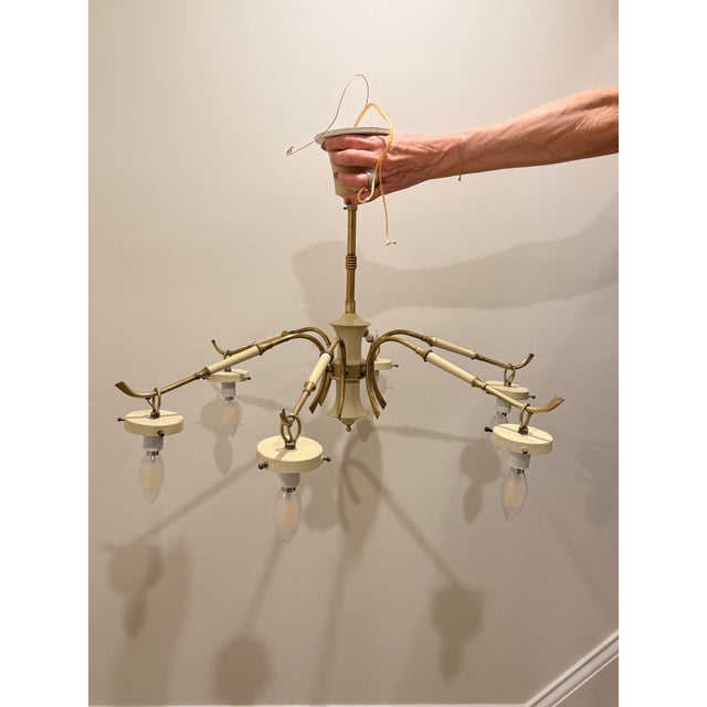 Vintage Stilnovo 6 Arm Chandelier We love a unique piece and this one fits the bill. A 1950s Italian Stilnovo chandelier...