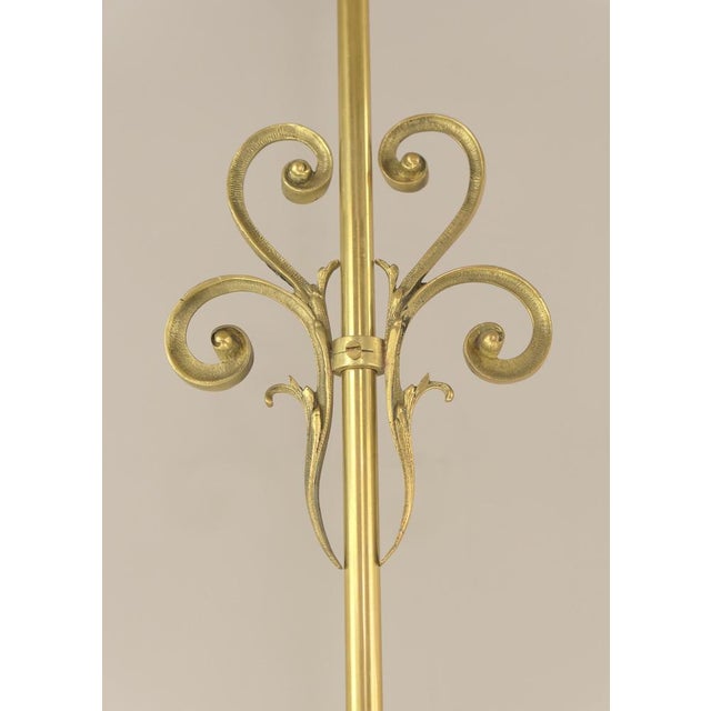 Massive brass hanging lamp with opal overlay glass shade The light provides a pleasant, glare-free light. Polished...