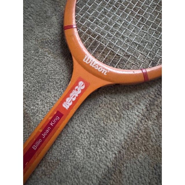 A handsome set of three vintage wood tennis rackets, each with its own distinctive detailing, patina, and classic sporting...