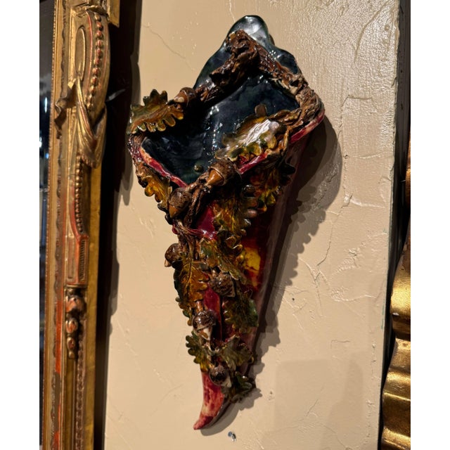 Add a touch of French country charm to a kitchen, dining room, or entryway with this colorful antique barbotine cornucopia...