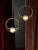 Pair of brass "Pulsar Singolo" chandelier. Dimensions: 36 x 10 x 36 cm. Materials: brass, crystal. Brass rings with a...