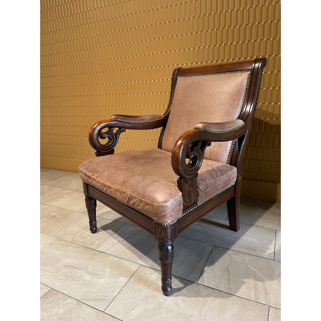 Bring stately, Old-World character into your home with this exceptional Empire Revival open armchair. Revival History: The...
