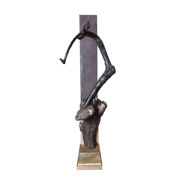 "Olivia" coat rack by Pietro Meccani, 1989. A beautiful sculptural object created by combining a natural element, the...
