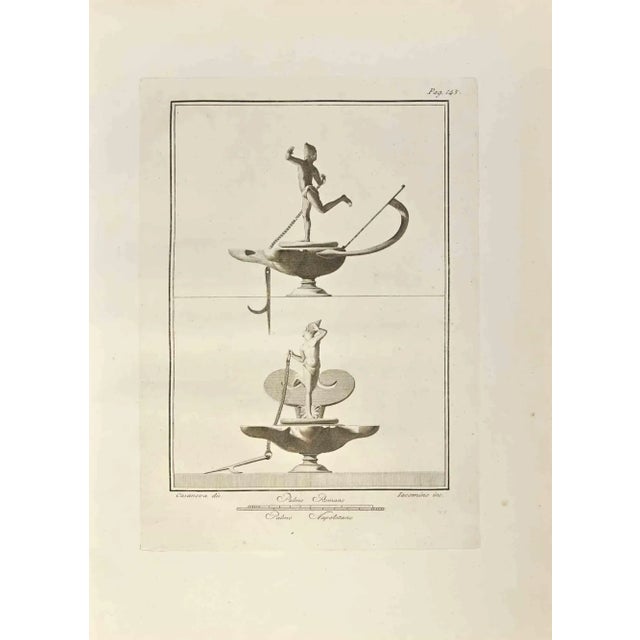 Oil Lamp with Sailor from "Antiquities of Herculaneum" is an etching on paper realized by Marcantonio Iacomino and Giacomo...