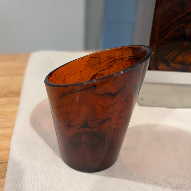 Gorgeous square tortoise shell lucite design. Square table top holder and side cup with angled edged rim. A great accent...