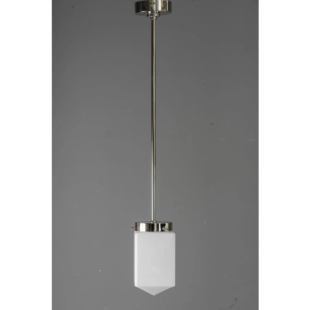 Art Deco nickel - plated pendant with opal glass shade vienna around 1920s. European Plug (up to 250V).The wiring of this...