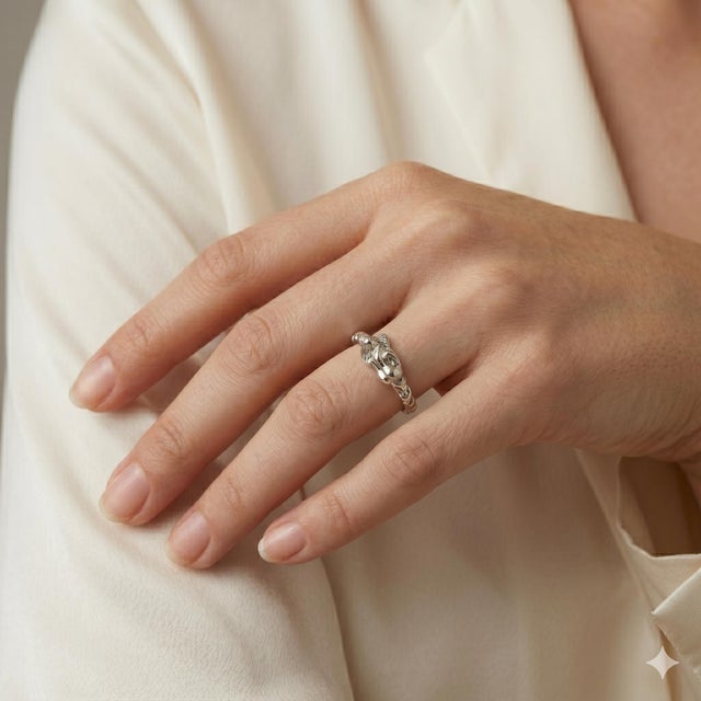 Embrace the spirit of elegance and adventure with our stunning 14k White Gold exotic Ring. Weighing 7.35 grams and...