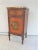 Louis xv style marble top nightstand made of walnut with satinwood veneers , one drawer over one door, door has a painted...