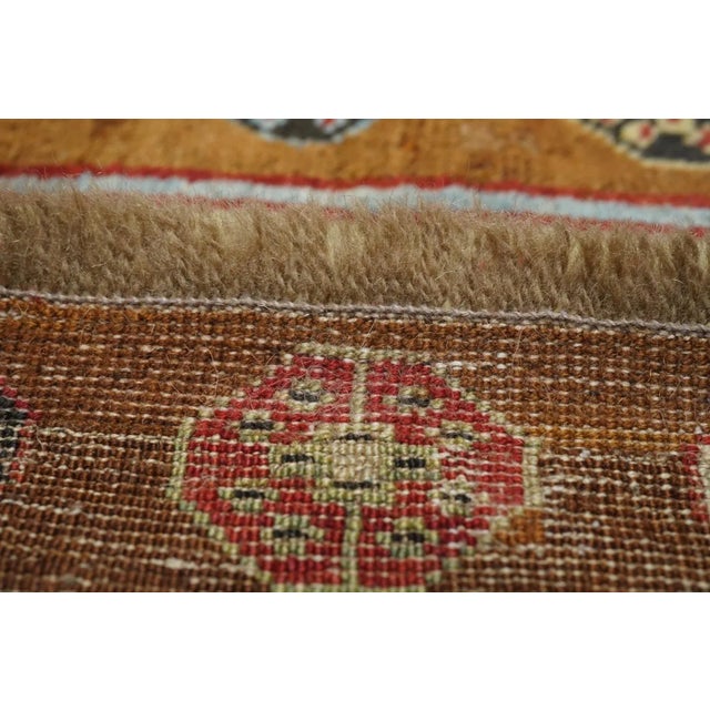 A study in camel tones, ecru and darkest brown, with two hexagonal cream medallions surrounded with tiny diamonds...