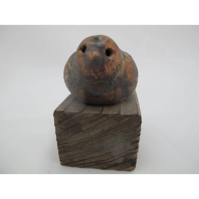 Sweet little bird figurine by Washington artist, Roy T. Stenger Tiny brushed and burnished copper bird perches on wooden...