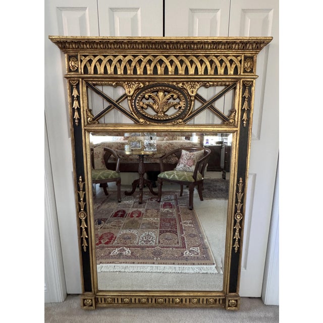 Offering for sale this very handsome Neoclassical-style giltwood wall mirror with the following fine features: - Made of...