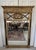 Offering for sale this very handsome Neoclassical-style giltwood wall mirror with the following fine features: - Made of...