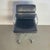 Vintage black leather Soft Pad Aluminium Group chair designed by Charles and Ray Eames and manufactured by ICF Italy under...