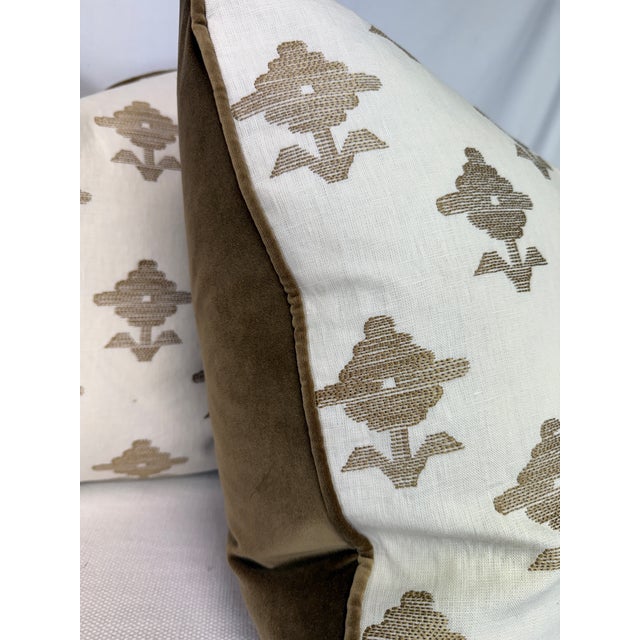 Custom pair of 22" pillows covered in Schumacher "Rubia Embroidery" in ivory and backed in a coordinating bronze cotton...