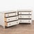 Pair of 20th century Danish chests of three drawers, crafted in pine. Carved dental molding accents the top, while lovely...