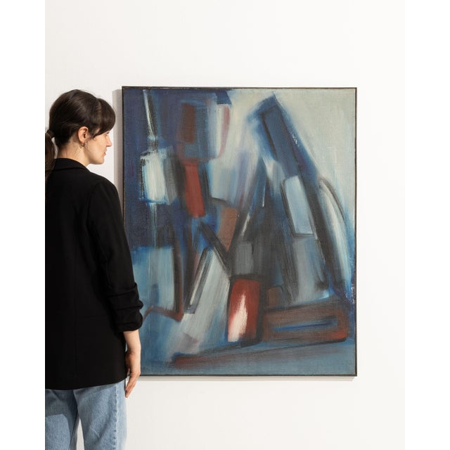 This 1960s painting from France is an oil on canvas, housed in a composition frame. Its form follows honest, well-...