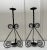 A pair of Spanish inspired to Abstract Modern styled black iron metal candle holders fit one pillar candle each. The...