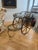 Beautiful antique brass and bamboo wood bar cart on wheels. Vintage and in very good condition.