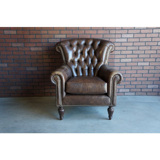 Exceptional quality and styling combine to give this leather chair and ottoman unending durability and timeless appeal....