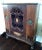 This antique is from the early 1900’s and appears to be an English Tudor design. I believe this to be walnut with burl and...