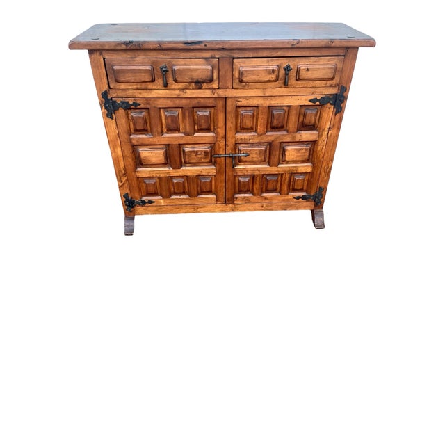 20th Century in the style of Baroque constructed of solid wood with rectangular top with molded edges. Two drawers over...