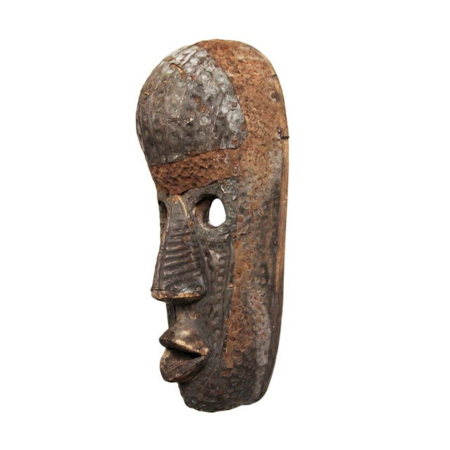 Authentic vintage traditional metal work mask from the Marka group of the Bamana (Bambara) tribe of Mali. Brass, nickel,...