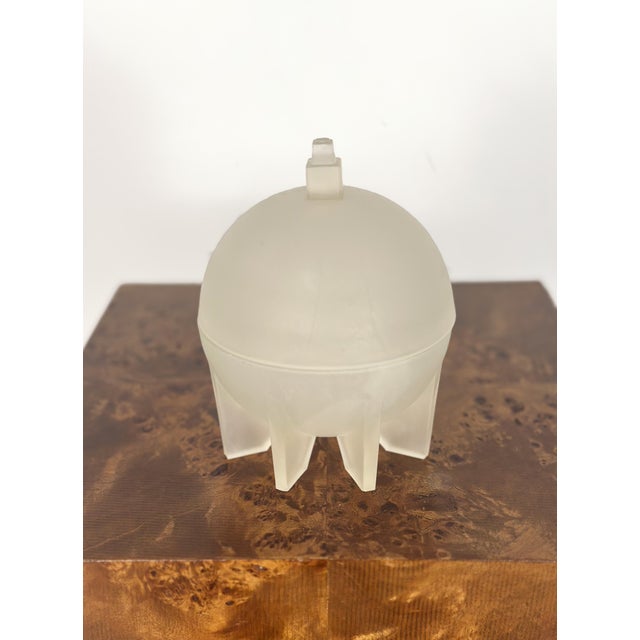 This frosted glass rocket candy dish captures the essence of the Space Age and is a fantastic piece of nostalgic design,...