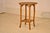 19th century round bamboo side table from France. The top has a lovely bamboo molding surrounding a basketweave pattern...