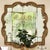 A beautiful mirror by Formations. Hand painted and hand carved, antique mirror finish. The Quatrefoil mirror.