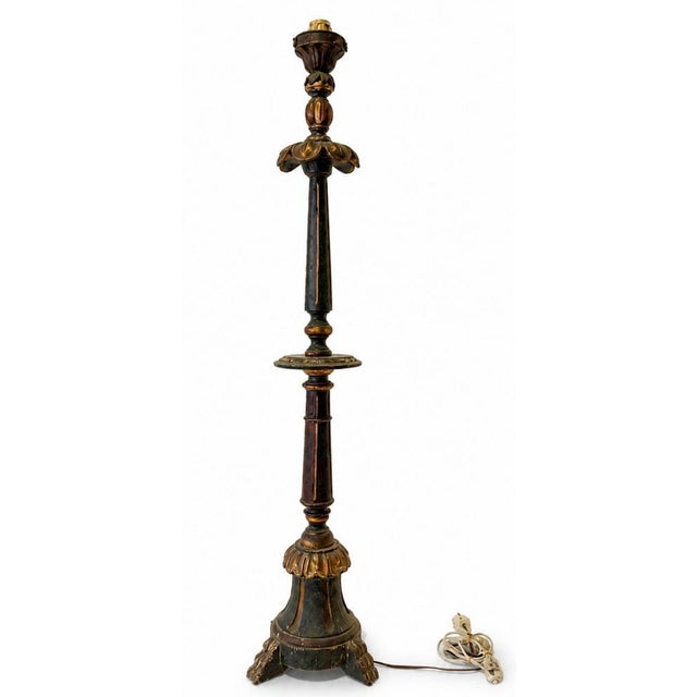 Large Torch Holder Portuguese, 19th century, carved, painted and gilded wood. Electrified. Dimensions: (Height) 141 cm...