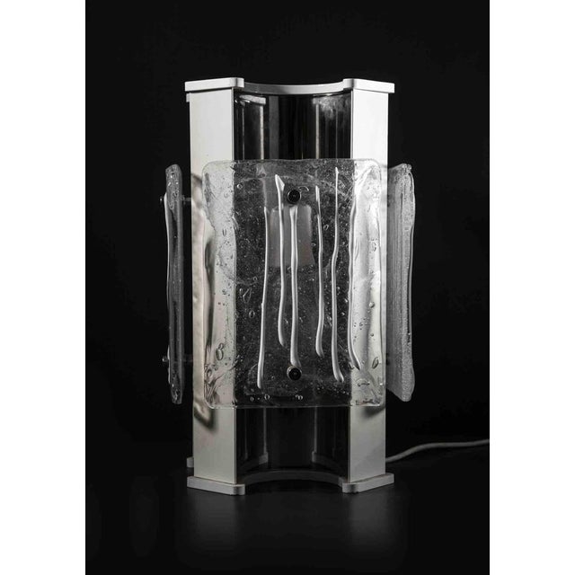 Table lamp is an original design lamp realized by angelo brotto in the 1970s a vintage lamp realized in murano glass with...