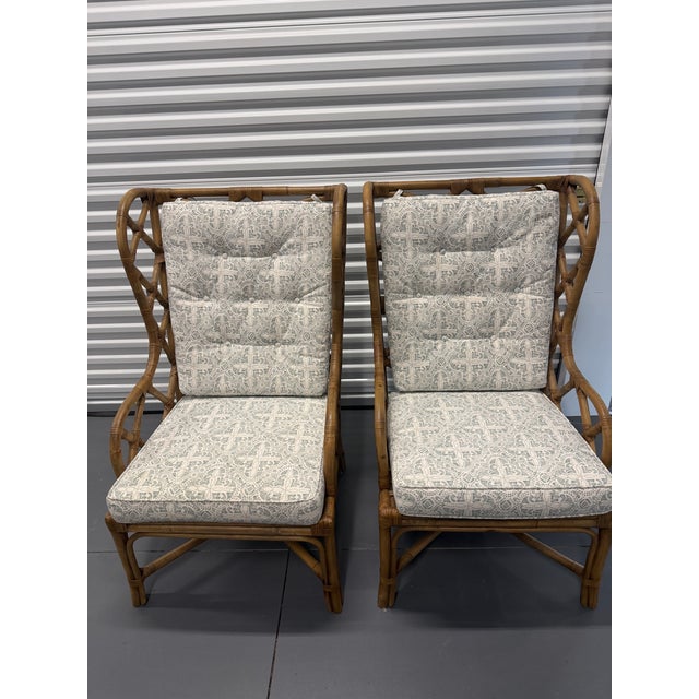 The Watson Chair features an elegant, open-weave design crafted from natural rattan, providing both durability and style....