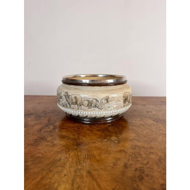 Antique Silver Rimmed Stoneware Bowl by Hannah Barlow for Royal Doulton, 1880, in Very Good conditions. Designed before 1890