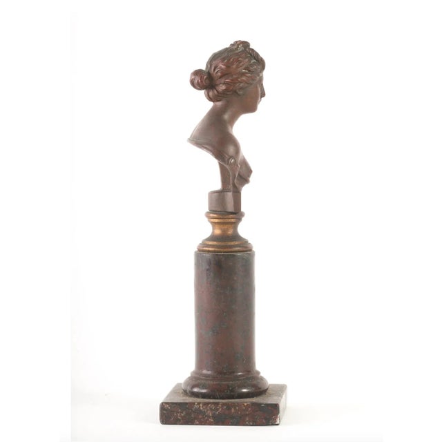 A 19th-century Italian Grand Tour bronze sculpture of a Bust of a Goddess, attributed to the renowned Naples Foundry,...