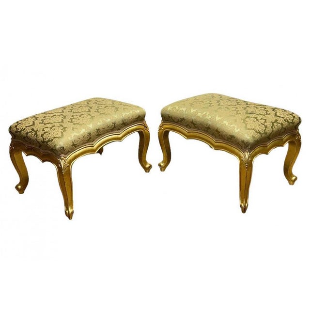 Matching pair of French gilt stools in the Empire manner Very comfortable with cushioned seats Recently upholstered so...