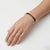 Elevate your accessory game with the exquisite Hermès Paris Bangle, a stunning fusion of luxury and elegance. Crafted from...