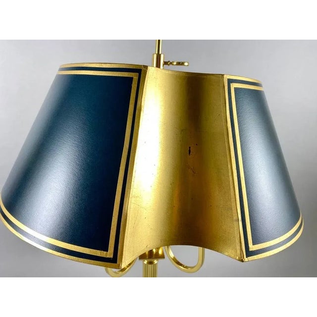 The luxurious table lamp is made in a classic style, the lamp stand is made of chiseled gilded brass, as the lampshade...