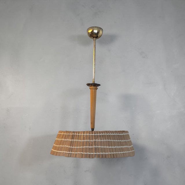 Exceptional and rare pendant lamp, a true masterpiece of Finnish design history from the 1940s. This unique and valuable...