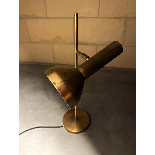 Beautiful mid-century design. 1970s table lamp made by the German company Cosack Leuchten. The lamp is made entirely of...